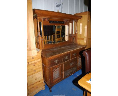 An Oak Art Nouveau mirror topped sideboard, 60'' wide x 23 1/2'' deep x 74 3/4'' high.