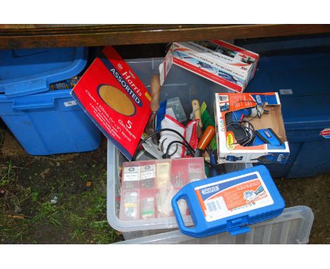 A plastic box of various tools lead lamp, tin snips, spanners, gardening tools, jubilee clips etc.