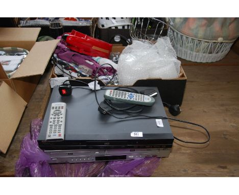 A DVD player and Samsung VHS & DVD recorder.