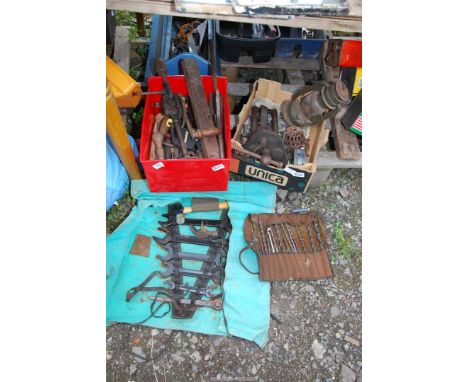 A plastic container of Vintage hand tools, carpenters vice, fold up bag of spanners, tool set, wood bits etc