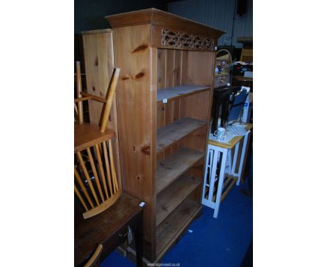 A Pine Shelf unit, 33'' wide x 10'' deep x 71'' high.