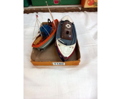 2 vintage battery operated boats, RNLI lifeboat and a fishing trawler 
