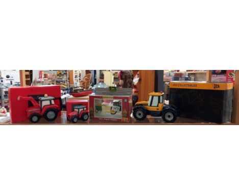 A JCB collectables Border Fine Arts fastrac money bank, Massey Ferguson big red tractor teapot, and egg cup and a John Deere 