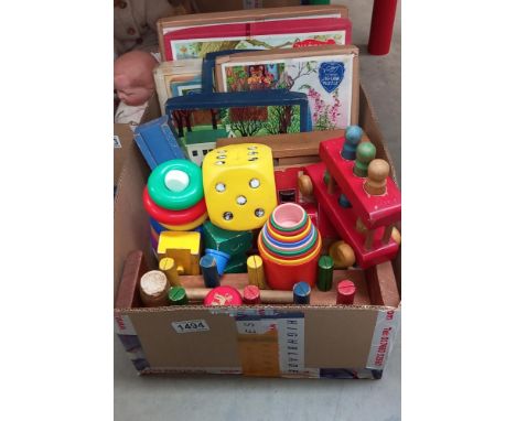 A box of vintage early learning toys and jigsaws etc 