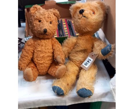 A vintage teddy bear with clockwork musical movement and 1 other 