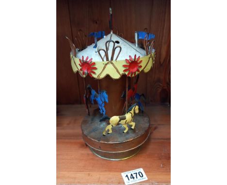 Vintage pressed steel merry-go-round 
