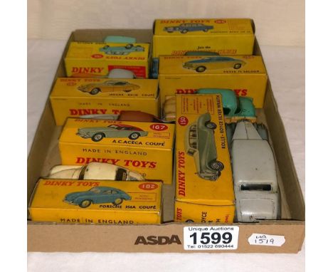 7 boxed Dinky sports and saloon cars including 157 Jaguar XK120, 182 Porsche 356A, 186 Mercedes 220SE, 155 Ford Anglia etc 