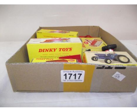 A boxed Dinky farm vehciles including 308 Leyland tractor (overpainted) 