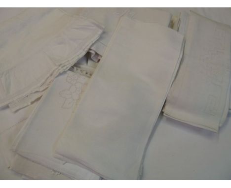 A mixed quantity of vintage bed linen, embroidered and some monogrammed, hand towels, pillow cases etc and embroidered and ot