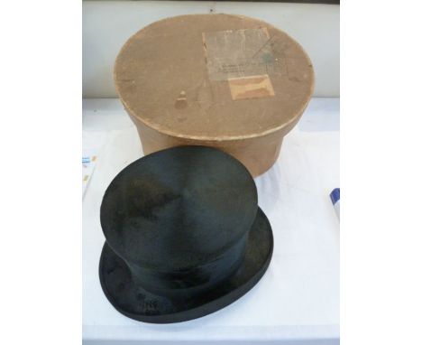 VINTAGE BLACK SILK TOP HAT. Initialled inside, leather internal rim, within a Dunn and Co. hat box