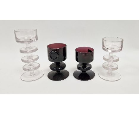 Four Wedgwood "Sheringham" glass candlesticks&nbsp;designed by Ronald Stennett-Wilson, to include a clear three ring candlest