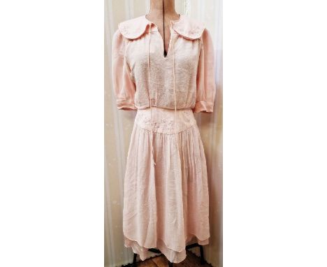 An Anna Belinda Oxford pink chiffon dress, embroidered drop waist button loop fastening to the side elbow length sleeves with