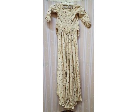 Late 18th century block printed cotton calico in imitation of embroidery, part full length dress (the back of the skirt is mi