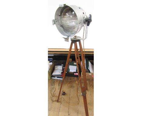 Vintage style metal and brass bound wood tripod spotlight on adjustable supports, and a vintage glass chrome globe and arrow 