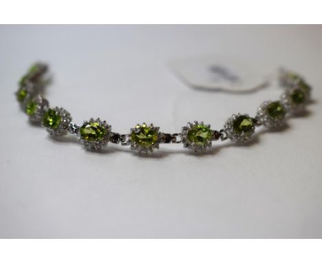 A silver and peridot bracelet   Condition report  Modern