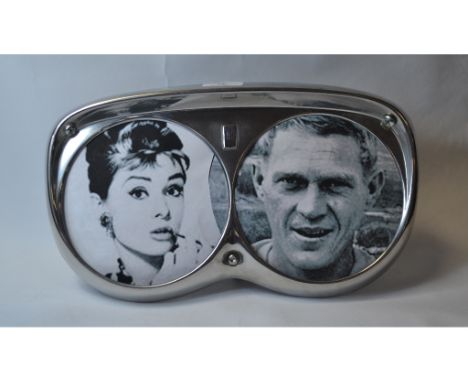 A double photograph frame, in the form of a Rolls-Royce style headlamp surround, 36 cm wide   Condition report  A reproductio