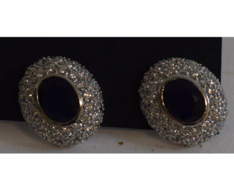 A pair of silver, sapphire and white stone stud earrings   Condition report  Modern