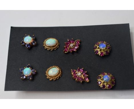 A pair of 9ct gold, opal and tanzanite flowerhead stud earrings, a pair of 9ct gold and opal stud earrings, and two other pai