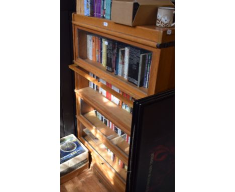 An oak Globe Wernicke style four section bookcase, 87 cm wide