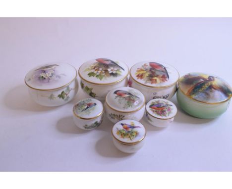 A Royal Worcester porcelain jar and cover, painted a bullfinch, 6.5 cm diameter and similar items (damages) (8)    Condition 