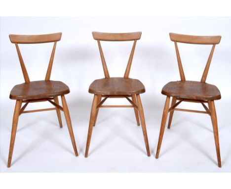 A set of five Ercol beech and elm stacking kitchen chairs (5)  See illustration   Condition report  Report by GHFive chairs i