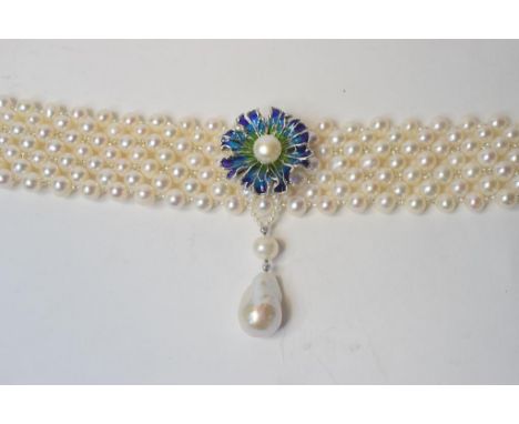 A simulated pearl choker, with silver and enamel central flowerhead   Condition report  Modern