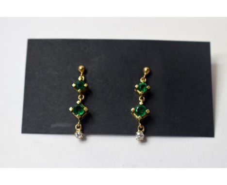 A pair of yellow coloured metal, emerald and diamond drop earrings, and a 9ct gold and opal necklace