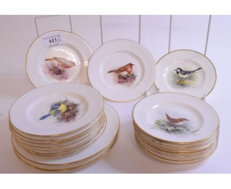 A Royal Worcester porcelain plate, painted a Redstart, signed W Powell, 15 cm diameter, and other similar plates, nine others
