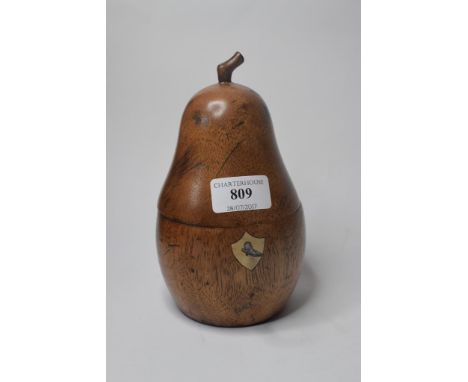 A treen tea caddy in the form of a pear, 18 cm high
