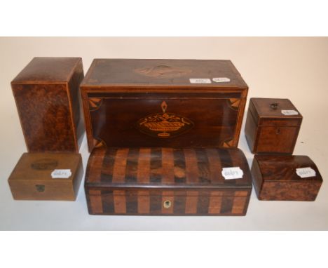 A late 19th/early 20th century inlaid amboyna tea caddy, 13 cm wide, and five other boxes (6)