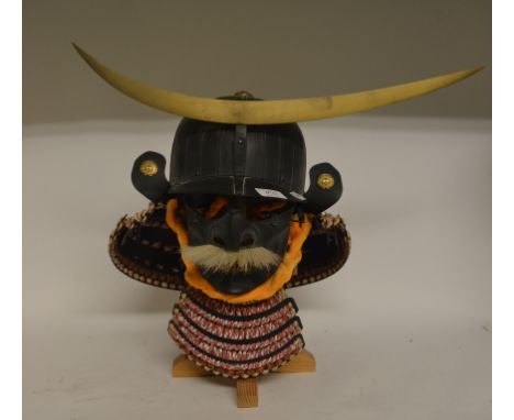 A Japanese Kabuto, modern, 51 cm wide, and a French Indochina helmet (2)