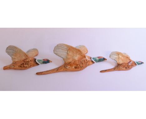 A set of three graduated Beswick Pheasant wall plaques, 661/1,2 &  3, one chipped, other Beswick, Royal Worcester and items (