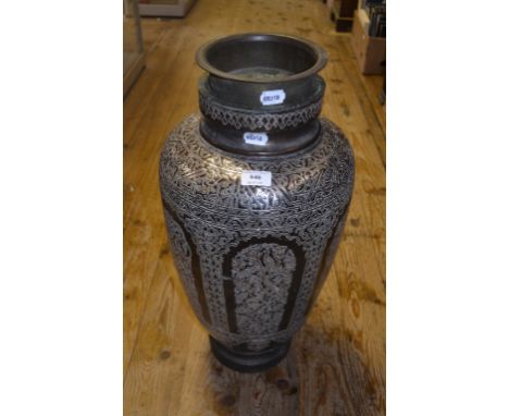 An Eastern metal vase, with silver coloured metal decoration, bottom loose, 57 cm high   Condition report  Report by GHGenera