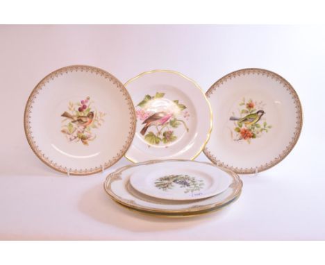 A Worcester porcelain plate, The Quail, and with gilt decoration, 23.5 cm wide, pair of other Spode plates, painted birds, a 