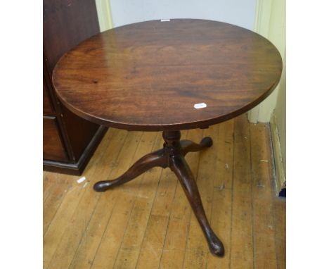 A mahogany tripod table, on a birdcage support,  64.5 cm diameter