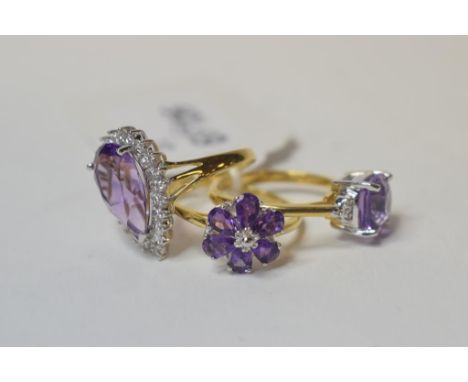 A silver, gold plated, amethyst and diamond ring, approx. ring size O, and two other similar (3)    Condition report  Modern