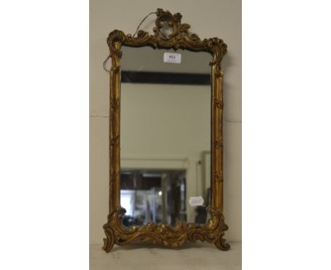 A 19th century gilt pier mirror, 36 cm wide, another mirror, and five prints (7) 