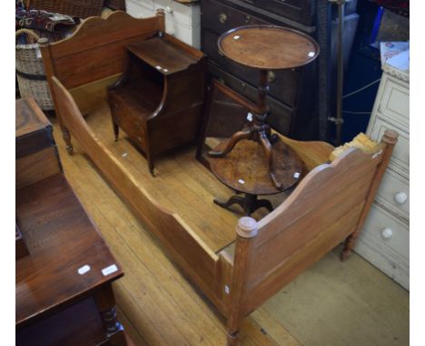 A mahogany tripod table, 44 cm wide, an oak tripod table, a early 19th century mahogany bedside cupboard/night commode, a pin