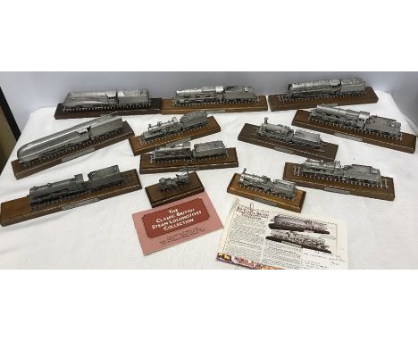 Danbury Mint classic British Steam locomotive pewter model collection. Ivatt Large Atlantic and The Rocket, loose on base.The