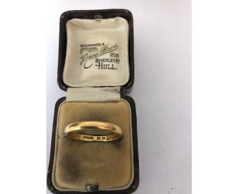 A 22 carat gold wedding ring. 4gms, Size R. 