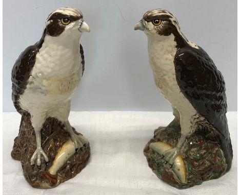A pair of Royal Doulton Whyte and Mackay scotch whisky Osprey bottles, modelled by D Lyttleton 1977. 20cms h. Appears to be s
