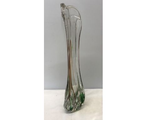 A tall studio glass vase, clear with green and brown streaks, signed to base Max Verboeket. Maastricht Art Glass. 58cms h. 