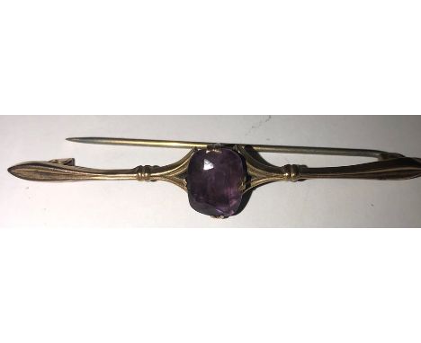Amethyst and 9 ct gold bar brooch. 2.8gms total. 7 cms l. 
