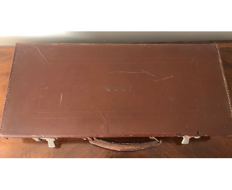 A vintage leather case containing masonic apron and various other items. Suitcase initialled J R C B.