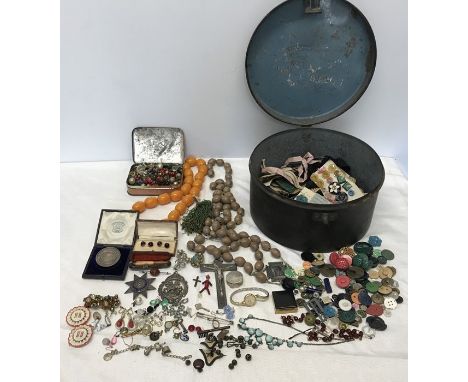 Tin hat box and contents, a quantity of buttons, costume jewellery, beads, large rosary with cross, silver and enamel brooch 