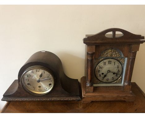 Oak cased mantle clock 37 x 26cms, brass cherub face with an oak cased napoleon hat mantle clock. 