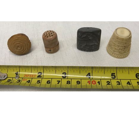 Large bone thimble, 3cms h with carved floral decoration, bone thimble with whale motif, small carved bone container with scr