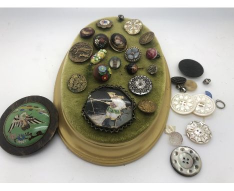 Vintage buttons etc, some mounted on velvet pad including enamel glass painted dogs head etc. 