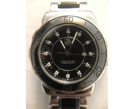 Contemporary ladies Tag Heuer Formula 1 wristwatch in steel and black ceramic case and bracelet, 12 diamonds to dial, date ap