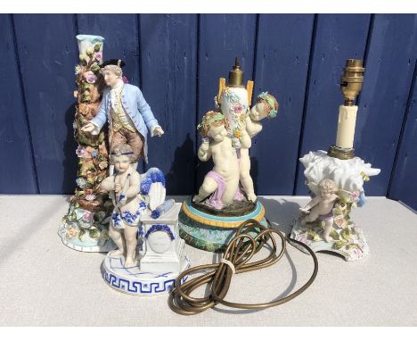 Four continental porcelain figures to include 3 lamp bases all with damage/repair. 33cms h tallest. 